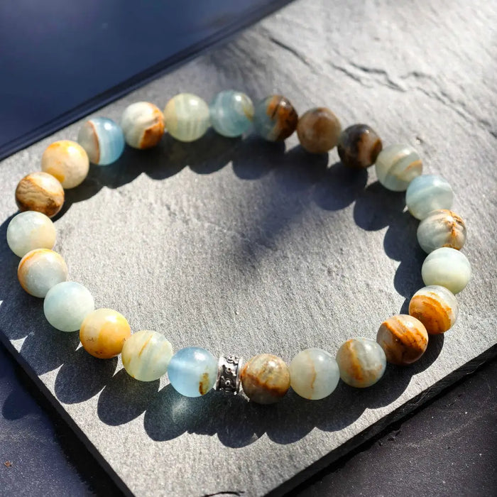 Lemurian Aquatine Calcite Bracelet II (8-9mm) - Secondary Specimen