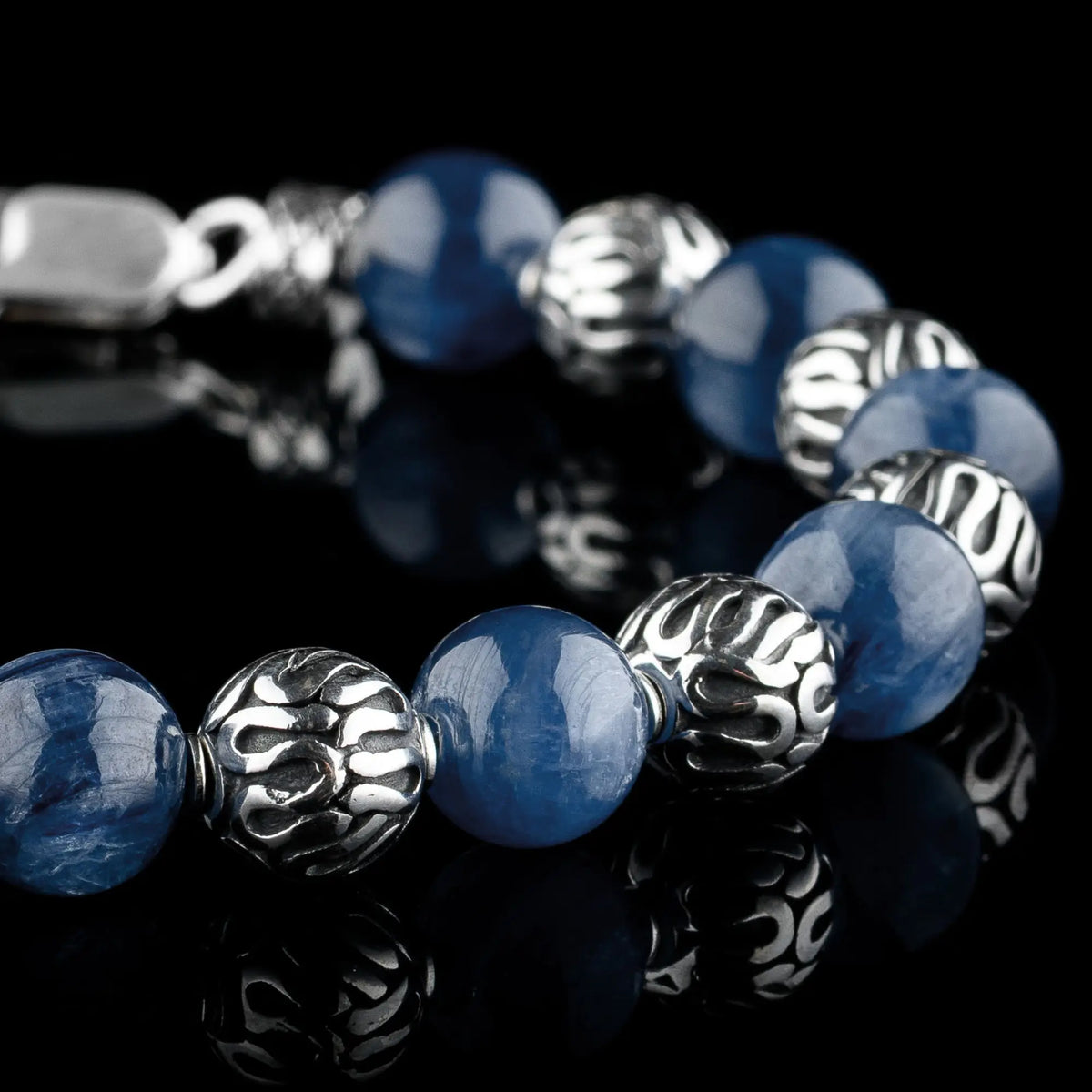 Kyanite VII — Close-up of blue kyanite stones and ornate spacers