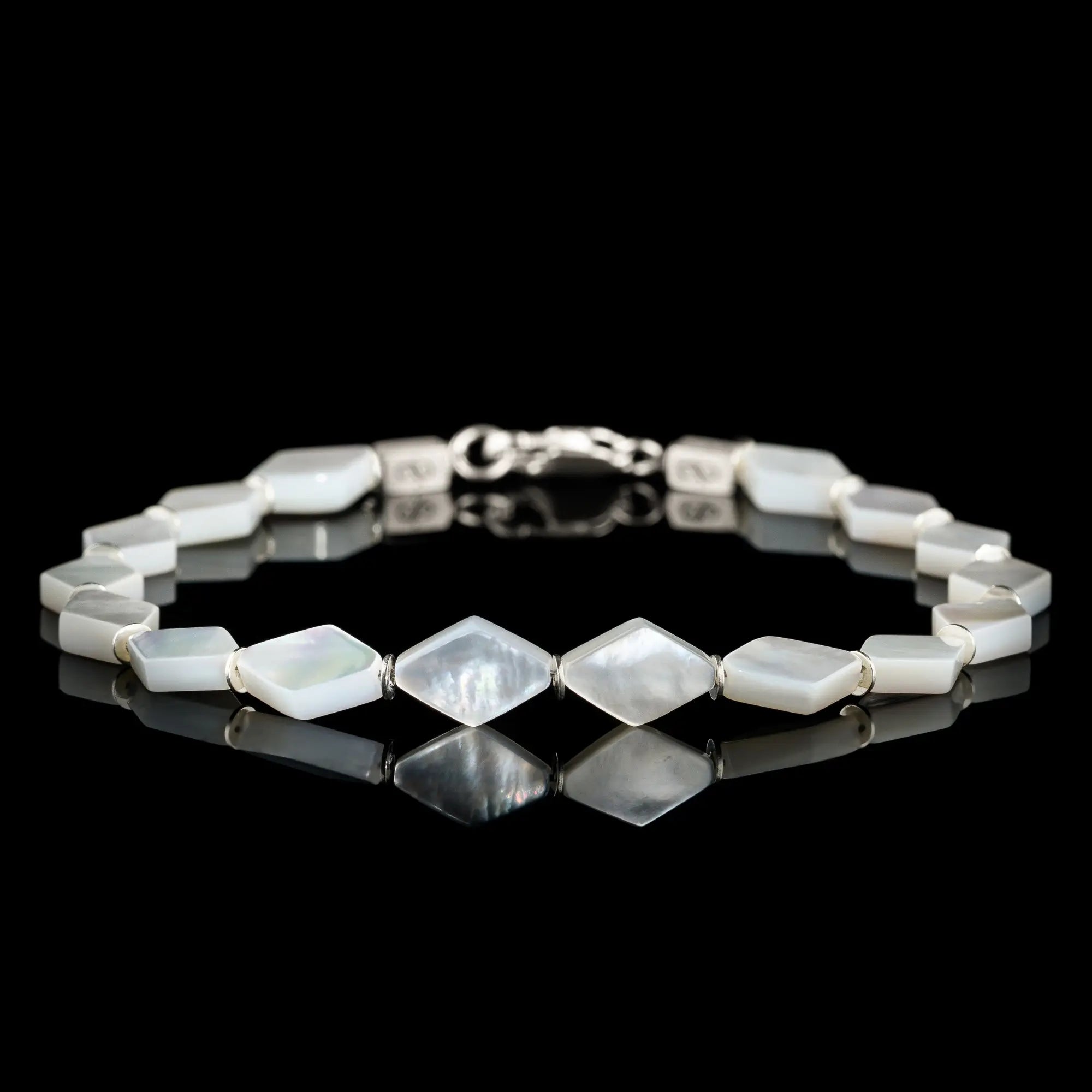 Silver lip oyster bracelet for men. 10x7mm shell tiles. Aurum Brothers.