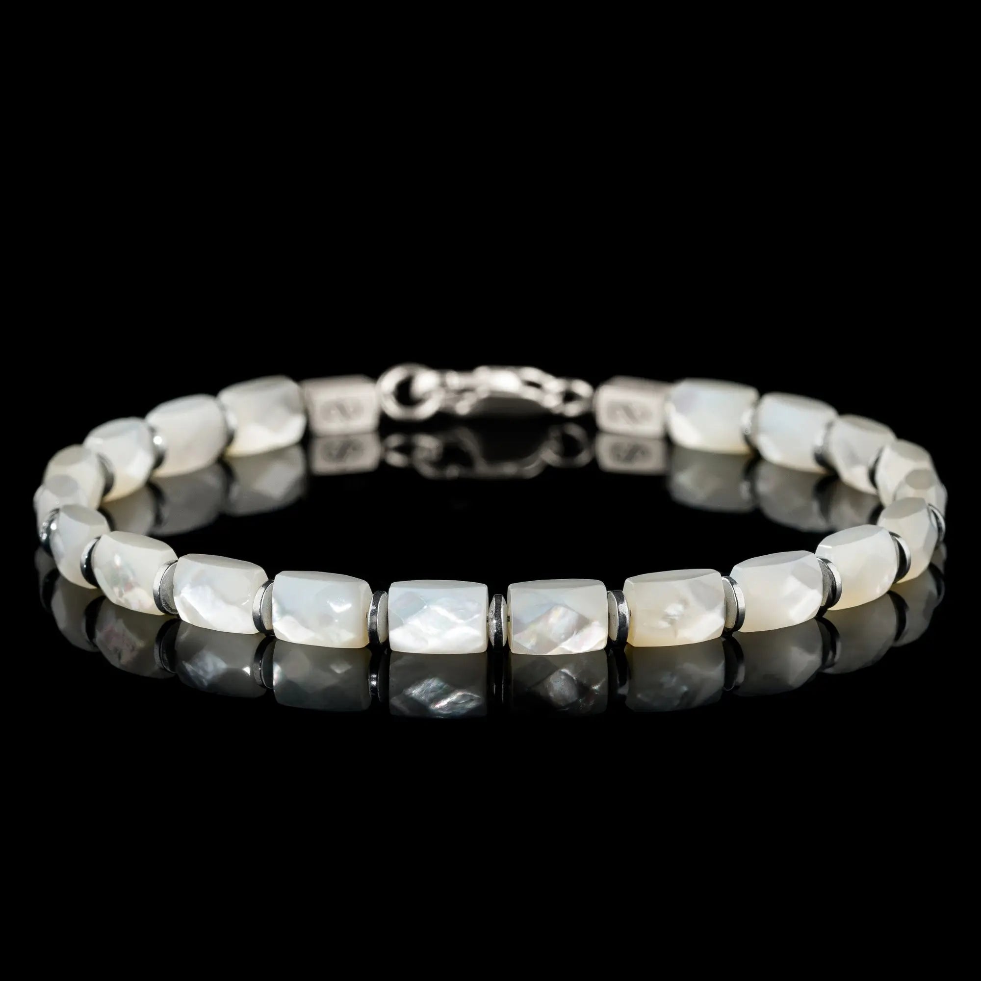 Silver lip oyster bracelet for men. 7x5mm shell tiles. Aurum Brothers.